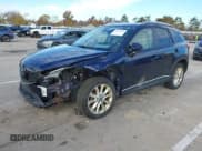 ✅ 2014 Mazda CX-5 Grand Touring • VIN: JM3KE4DY7E0376694 • Lot: 43606054. Listed on IAAI with 155,652 mi. Free auction sales archive from the USA and detailed vehicle history report at DreamBid. Image 2.