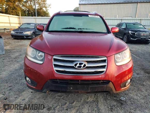 ✅ 2012 Hyundai Santa Fe SE • VIN: 5XYZHDAG9CG108036 • Lot: 75458614. Listed on Copart with 63,718 mi. Free auction sales archive from the USA and detailed vehicle history report at DreamBid. Image 5.