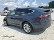 ✅ 2017 Tesla Model X 90D • VIN: 5YJXCDE23HF044191 • Lot: 70591435. Wystawiony na Copart z przebiegiem 103 208 mil. Bezpłatny archiwum sprzedaży aukcyjnych z USA i szczegółowy raport historii pojazdu na DreamBid. Zdjęcie 2.