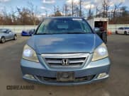 ✅ 2006 Honda Odyssey EX-L • VIN: 5FNRL38776B070297 • Лот: 95570655. Опубликован ранее на Copart с пробегом 124 763 миль. Бесплатный доступ к архиву аукционных продаж из США и подробный отчёт об истории автомобиля на DreamBid. Изображение 5.