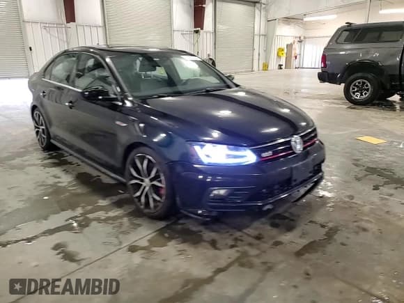 ✅ 2016 Volkswagen Jetta GLI SE • VIN: 3VW5S7AJ4GM262740 • Лот: 64232325. Опубликован ранее на Copart с пробегом 65 112 миль. Бесплатный доступ к архиву аукционных продаж из США и подробный отчёт об истории автомобиля на DreamBid. Изображение 13.