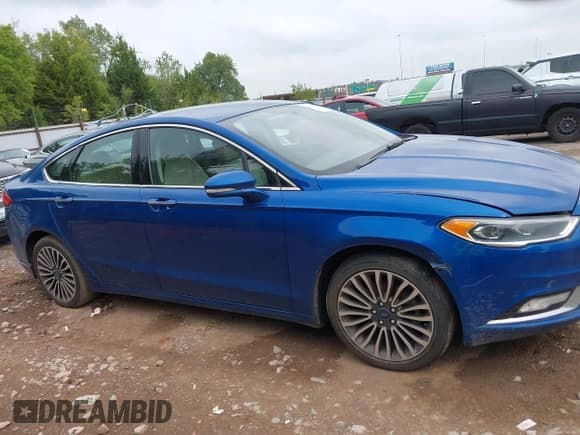 ✅ 2017 Ford Fusion Hybrid Titanium • VIN: 3FA6P0RU4HR388525 • Lot: 43136734. Wystawiony na IAAI z przebiegiem 206 994 mil. Bezpłatny archiwum sprzedaży aukcyjnych z USA i szczegółowy raport historii pojazdu na DreamBid. Zdjęcie 13.