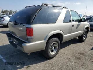 ✅ 2005 Chevrolet Blazer • VIN: 1GNCS18X95K107274 • Lot: 89013455. Wystawiony na Copart z przebiegiem 98 047 mil. Bezpłatny archiwum sprzedaży aukcyjnych z USA i szczegółowy raport historii pojazdu na DreamBid. Zdjęcie 3.