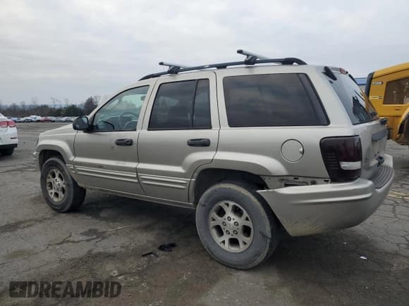 ✅ 2003 Jeep Grand Cherokee Laredo • VIN: 1J4GX48S73C518854 • Лот: 92987425. Опубликован ранее на Copart с пробегом 332 375 миль. Бесплатный доступ к архиву аукционных продаж из США и подробный отчёт об истории автомобиля на DreamBid. Изображение 2.