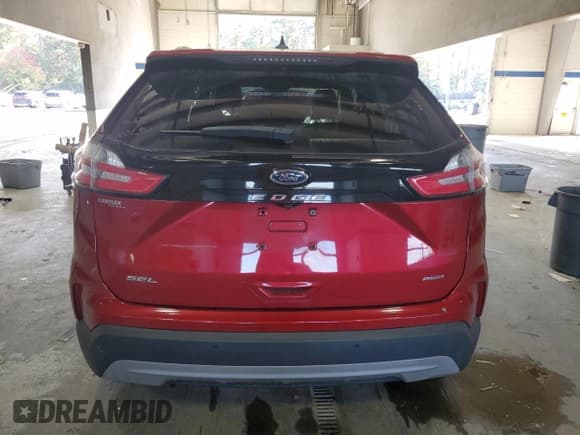 ✅ 2021 Ford Edge SEL • VIN: 2FMPK4J90MBA13022 • Lot: 90825505. Listed on Copart with 59,571 mi. Free auction sales archive from the USA and detailed vehicle history report at DreamBid. Image 6.