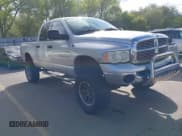 ✅ 2004 Dodge 2500 SLT • VIN: 3D7KU28D04G161343 • Lot: 39342393. Wystawiony na IAAI z przebiegiem 154 298 mil. Bezpłatny archiwum sprzedaży aukcyjnych z USA i szczegółowy raport historii pojazdu na DreamBid. Zdjęcie 1.