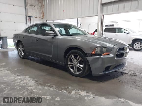 ✅ 2012 Dodge Charger SXT Plus • VIN: 2C3CDXJG2CH236465 • Lot: 42898585. Listed on IAAI with 149,670 mi. Free auction sales archive from the USA and detailed vehicle history report at DreamBid. Image 1.