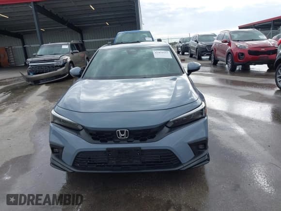 ✅ 2024 Honda Civic Sport Touring • VIN: 19XFL1G88RE011755 • Lot: 43459157. Listed on IAAI with 5,597 mi. Free auction sales archive from the USA and detailed vehicle history report at DreamBid. Image 12.