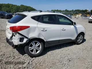 2013 Hyundai Tucson GLS z VIN KM8JUCAC6DU618954, wystawiony jako Copart lot #69253264 z przebiegiem 162 198 mil mil oraz Szkoda całkowita • Salvage title. Historia ofert i sprzedaży dostępna na DreamBid. Obrazek 3.
