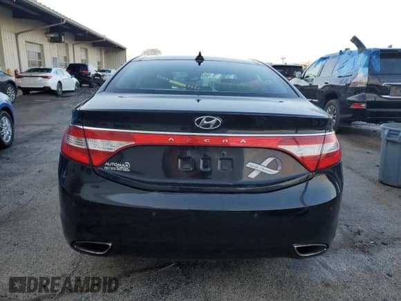 2013 Hyundai Azera с VIN KMHFH4JG8DA244285, выставлен на аукционе Copart как лот 85106264 с пробегом 150 047 миль миль и Списание • Salvage title. История ставок и продаж доступна на DreamBid. Изображение 6.