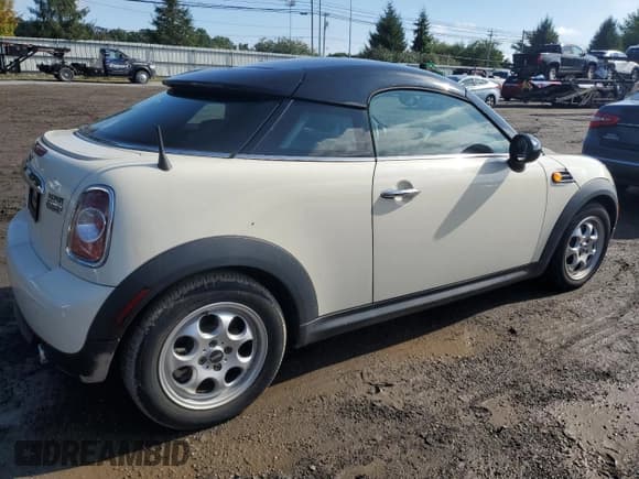 ✅ 2012 MINI Coupe • VIN: WMWSX1C52CT164027 • Lot: 74329124. Listed on Copart with Not provided. Free auction sales archive from the USA and detailed vehicle history report at DreamBid. Image 3.