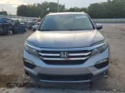 ✅ 2017 Honda Pilot Touring • VIN: 5FNYF6H94HB047892 • Lot: 80333605. Listed on Copart with 81,566 mi. Free auction sales archive from the USA and detailed vehicle history report at DreamBid. Image 5.