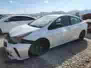 2021 Toyota Prius L Eco with VIN JTDKAMFU5M3127192, listed as a Copart auction lot 80371565 with 77,510 mi miles and Salvage title. Bid and sale history available at DreamBid. Image 1.