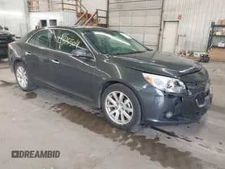 2016 Chevrolet Malibu LTZ z VIN 1G11E5SA7GU114386, wystawiony jako IAAI lot #43155041 z przebiegiem 166 009 mil mil oraz . Historia ofert i sprzedaży dostępna na DreamBid. Obrazek 1.