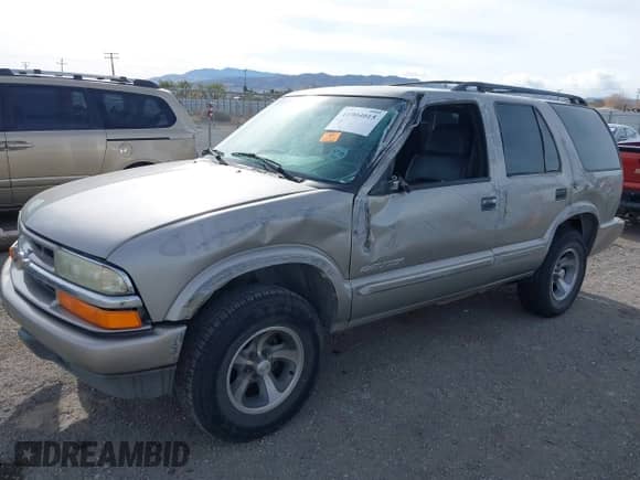 2004 Chevrolet Blazer Fleet z VIN 1GNCS13X54K143744, wystawiony jako IAAI lot #41904015 z przebiegiem Nie podano mil oraz . Historia ofert i sprzedaży dostępna na DreamBid. Obrazek 2.