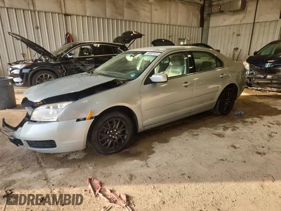 ✅ 2006 Mercury Milan • VIN: 3MEHM07Z76R653704 • Лот: 86867925. Опубликован ранее на Copart с пробегом 60 784 миль. Бесплатный доступ к архиву аукционных продаж из США и подробный отчёт об истории автомобиля на DreamBid. Изображение 1.