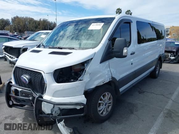 ✅ 2021 Ford Transit Passenger XL • VIN: 1FBAX2Y88MKA15155 • Lot: 41730982. Listed on IAAI with 70,357 mi. Free auction sales archive from the USA and detailed vehicle history report at DreamBid. Image 2.