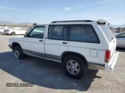 ✅ 1992 GMC Jimmy SLE Convenience • VIN: 1GKDT13W9N2524813 • Lot: 54004095. Wystawiony na Copart z przebiegiem 151 535 mil. Bezpłatny archiwum sprzedaży aukcyjnych z USA i szczegółowy raport historii pojazdu na DreamBid. Zdjęcie 2.