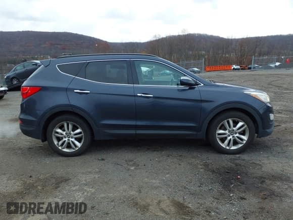 ✅ 2014 Hyundai Santa Fe • VIN: 5XYZWDLA8EG174613 • Лот: 43680209. Опубликован ранее на IAAI с пробегом 269 810 миль. Бесплатный доступ к архиву аукционных продаж из США и подробный отчёт об истории автомобиля на DreamBid. Изображение 13.