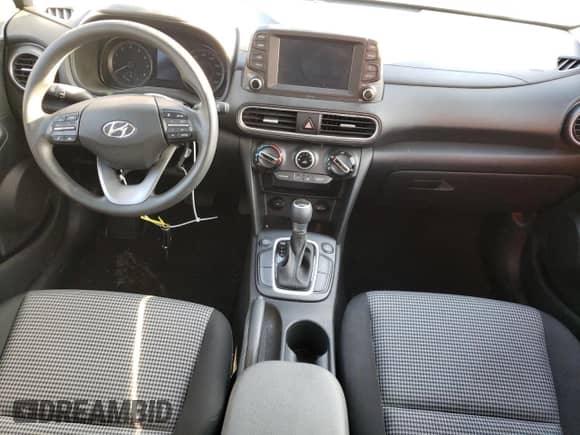 2019 Hyundai Kona SE z VIN KM8K1CAA8KU373275, wystawiony jako Copart lot #70511242 z przebiegiem Nie podano mil oraz . Historia ofert i sprzedaży dostępna na DreamBid. Obrazek 8.