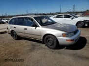 ✅ 1994 Toyota Corolla DX • VIN: JT2AE09V9R0055606 • Lot: 80118565. Listed on Copart with 202,865 mi. Free auction sales archive from the USA and detailed vehicle history report at DreamBid. Image 4.