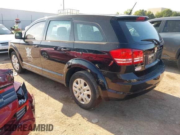 ✅ 2014 Dodge Journey American Value • VIN: 3C4PDCAB6ET281610 • Lot: 43211300. Listed on IAAI with 128,713 mi. Free auction sales archive from the USA and detailed vehicle history report at DreamBid. Image 3.