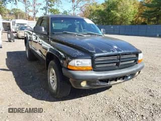 2002 Dodge Dakota Sport z VIN 1B7GG32N12S677909, wystawiony jako IAAI lot #43502775 z przebiegiem 140 640 mil mil oraz . Historia ofert i sprzedaży dostępna na DreamBid. Obrazek 1.