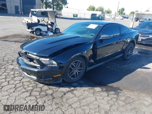 ✅ 2012 Ford Mustang Premium • VIN: 1ZVBP8AM4C5261141 • Lot: 43217325. Listed on IAAI with 129,419 mi. Free auction sales archive from the USA and detailed vehicle history report at DreamBid. Image 18.