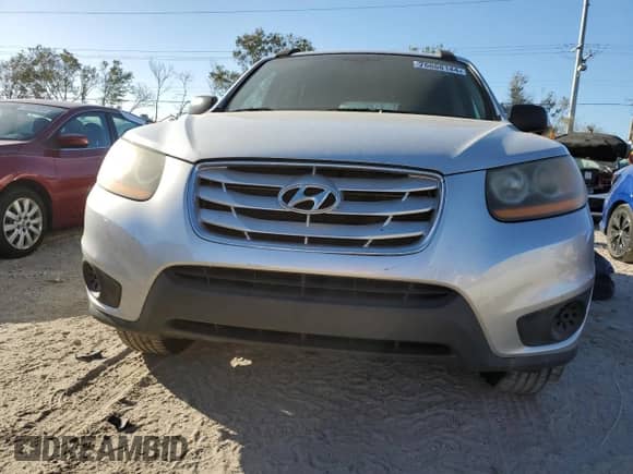 2011 Hyundai Santa Fe GLS с VIN 5XYZG3AB5BG035831, выставлен на аукционе Copart как лот 76668144 с пробегом 147 729 миль миль и Списание • Salvage title. История ставок и продаж доступна на DreamBid. Изображение 5.