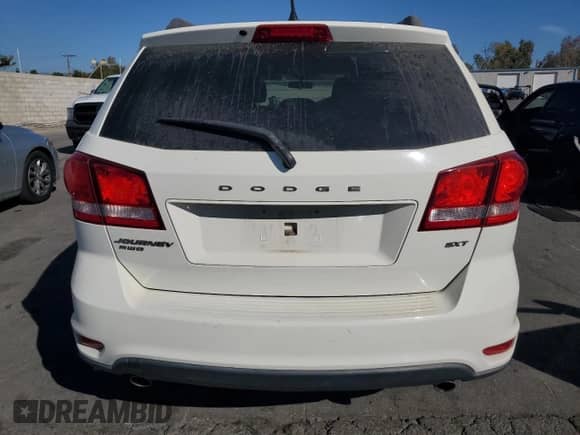 2017 Dodge Journey SXT с VIN 3C4PDDBG8HT578561, выставлен на аукционе Copart как лот 91510395 с пробегом 108 434 миль миль и Чистый • Clean title. История ставок и продаж доступна на DreamBid. Изображение 6.