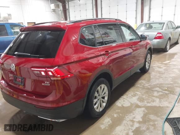 ✅ 2018 Volkswagen Tiguan S • VIN: 3VV0B7AX5JM104191 • Lot: 42492503. Listed on IAAI with 96,339 mi. Free auction sales archive from the USA and detailed vehicle history report at DreamBid. Image 4.