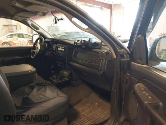 2002 Dodge 1500 z VIN 1D7HU16N72J162629, wystawiony jako IAAI lot #43555857 z przebiegiem 204 083 mil mil oraz . Historia ofert i sprzedaży dostępna na DreamBid. Obrazek 5.