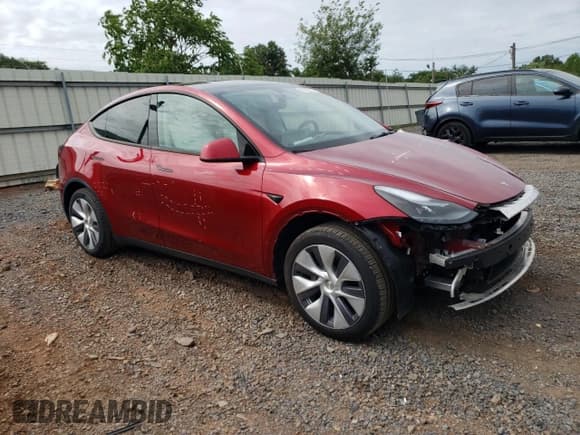 ✅ 2024 Tesla Model Y Long Range • VIN: 7SAYGDEE2RA258805 • Lot: 69405855. Listed on Copart with 13,620 mi. Free auction sales archive from the USA and detailed vehicle history report at DreamBid. Image 4.