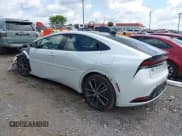 ✅ 2024 Toyota Prius LE • VIN: JTDACAAU3R3034772 • Lot: 42707648. Listed on IAAI with 15,044 mi. Free auction sales archive from the USA and detailed vehicle history report at DreamBid. Image 3.