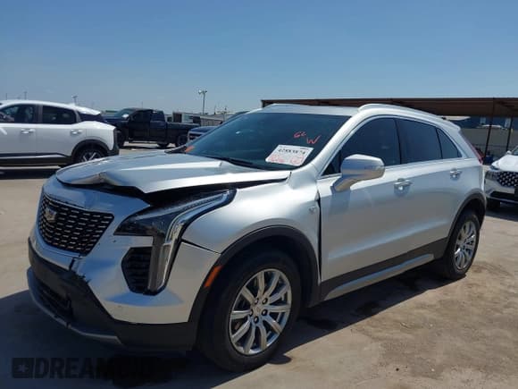 ✅ 2021 Cadillac XT4 FWD Premium Luxury • VIN: 1GYFZCR43MF084707 • Лот: 42883874. Опубликован ранее на IAAI с пробегом 54 356 миль. Бесплатный доступ к архиву аукционных продаж из США и подробный отчёт об истории автомобиля на DreamBid. Изображение 2.