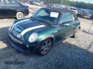 ✅ 2007 MINI Convertible S • VIN: WMWRH33557TJ44349 • Lot: 42799773. Listed on IAAI with 92,482 mi. Free auction sales archive from the USA and detailed vehicle history report at DreamBid. Image 2.