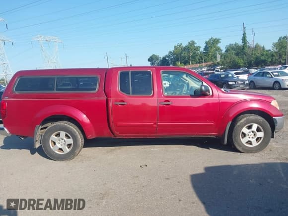 ✅ 2007 Nissan Frontier SE • VIN: 1N6AD09W27C454336 • Lot: 42849052. Listed on IAAI with 161,367 mi. Free auction sales archive from the USA and detailed vehicle history report at DreamBid. Image 14.