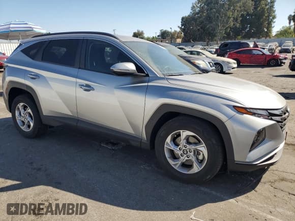 ✅ 2022 Hyundai Tucson SEL • VIN: 5NMJB3AE1NH099428 • Lot: 74963464. Wystawiony na Copart z przebiegiem 29 037 mil. Bezpłatny archiwum sprzedaży aukcyjnych z USA i szczegółowy raport historii pojazdu na DreamBid. Zdjęcie 4.