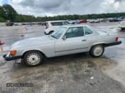 ✅ 1989 Mercedes-Benz 560 SL • VIN: WDBBA48D3KA103641 • Lot: 65051325. Wystawiony na Copart z przebiegiem 125 249 mil. Bezpłatny archiwum sprzedaży aukcyjnych z USA i szczegółowy raport historii pojazdu na DreamBid. Zdjęcie 1.