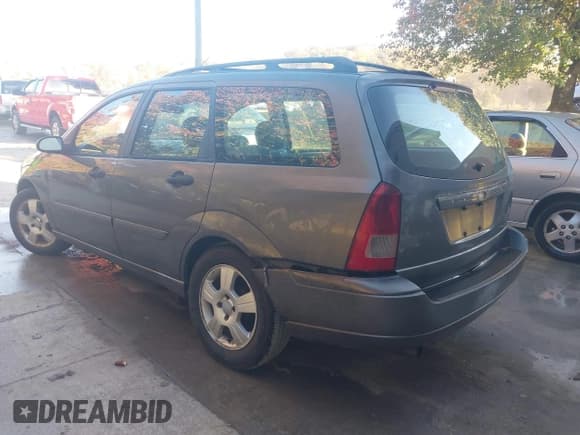 ✅ 2003 Ford Focus SE Fleet • VIN: 1FAFP36303W293074 • Lot: 43709410. Listed on IAAI with 260,595 mi. Free auction sales archive from the USA and detailed vehicle history report at DreamBid. Image 3.