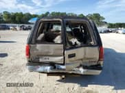 ✅ 1999 GMC Yukon • VIN: 1GKEC13R8XJ750848 • Lot: 58197545. Listed on Copart with 319,551 mi. Free auction sales archive from the USA and detailed vehicle history report at DreamBid. Image 6.