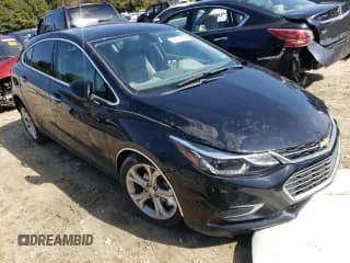 ✅ 2018 Chevrolet Cruze Premier • VIN: 3G1BF6SM2JS574550 • Lot: 62915732. Listed on Copart with 62,960 mi. Free auction sales archive from the USA and detailed vehicle history report at DreamBid. Image 1.