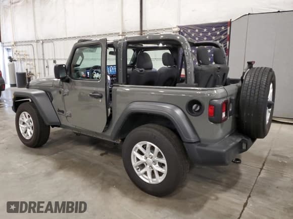 ✅ 2023 Jeep Wrangler Sport S • VIN: 1C4HJXAG9PW677785 • Lot: 70341275. Listed on Copart with 32,130 mi. Free auction sales archive from the USA and detailed vehicle history report at DreamBid. Image 2.