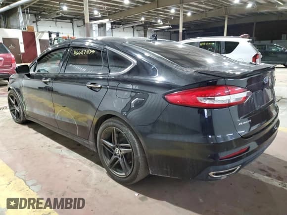 ✅ 2019 Ford Fusion Titanium • VIN: 3FA6P0K97KR260437 • Lot: 46627535. Listed on Copart with 146,089 mi. Free auction sales archive from the USA and detailed vehicle history report at DreamBid. Image 2.