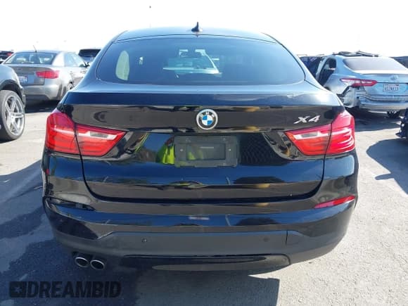 ✅ 2015 BMW X4 xDrive28i • VIN: 5UXXW3C51F0F89334 • Lot: 43589142. Listed on IAAI with 152,029 mi. Free auction sales archive from the USA and detailed vehicle history report at DreamBid. Image 16.
