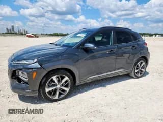 ✅ 2020 Hyundai Kona Ultimate • VIN: KM8K53A5XLU421139 • Лот: 71557165. Опубликован ранее на Copart с пробегом 128 218 миль. Бесплатный доступ к архиву аукционных продаж из США и подробный отчёт об истории автомобиля на DreamBid. Изображение 1.