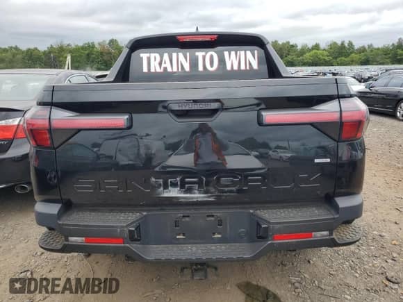 2022 Hyundai Santa Cruz SEL с VIN 5NTJBDAE7NH004395, выставлен на аукционе Copart как лот 68987174 с пробегом Не указан миль и Списание • Salvage title. История ставок и продаж доступна на DreamBid. Изображение 6.