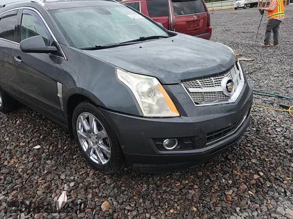 ✅ 2012 Cadillac SRX Performance Collection • VIN: 3GYFNBE30CS598950 • Lot: 81205505. Listed on Copart with 96,413 mi. Free auction sales archive from the USA and detailed vehicle history report at DreamBid. Image 14.