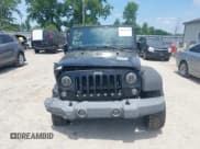 ✅ 2015 Jeep Wrangler Willys Wheeler • VIN: 1C4AJWAG9FL518759 • Lot: 42674716. Listed on IAAI with 211,446 mi. Free auction sales archive from the USA and detailed vehicle history report at DreamBid. Image 12.