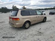 ✅ 2002 Honda Odyssey EX-L • VIN: 2HKRL189X2H586400 • Lot: 82102575. Listed on Copart with 263,380 mi. Free auction sales archive from the USA and detailed vehicle history report at DreamBid. Image 3.